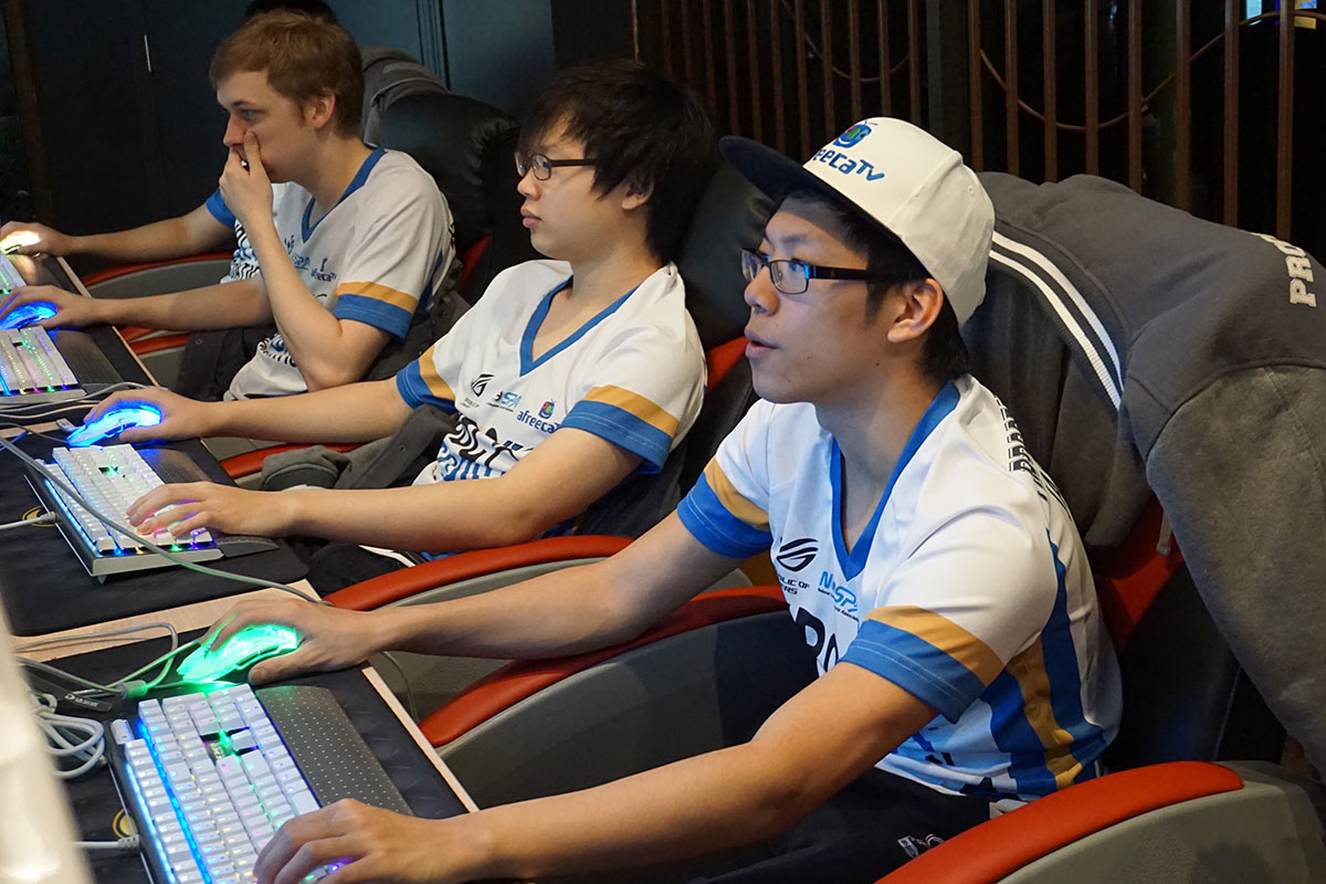 Some of the only times the players get to work together in person are at Internet cafes like this one.