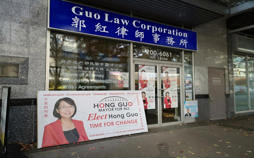 Poster outside Guo Law Corporation on No. 3 Road in Richmond